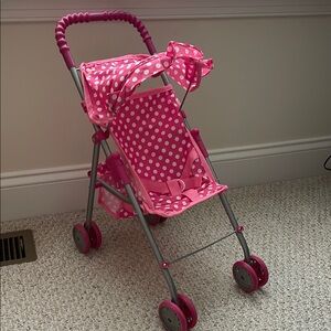 Pink and White Doll Stroller with Foldable Frame and Adjustable Canopy